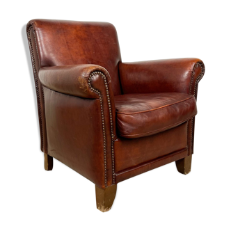 Vintage dark brown sheep leather armchair