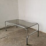 Table basse chrome et verre fumé