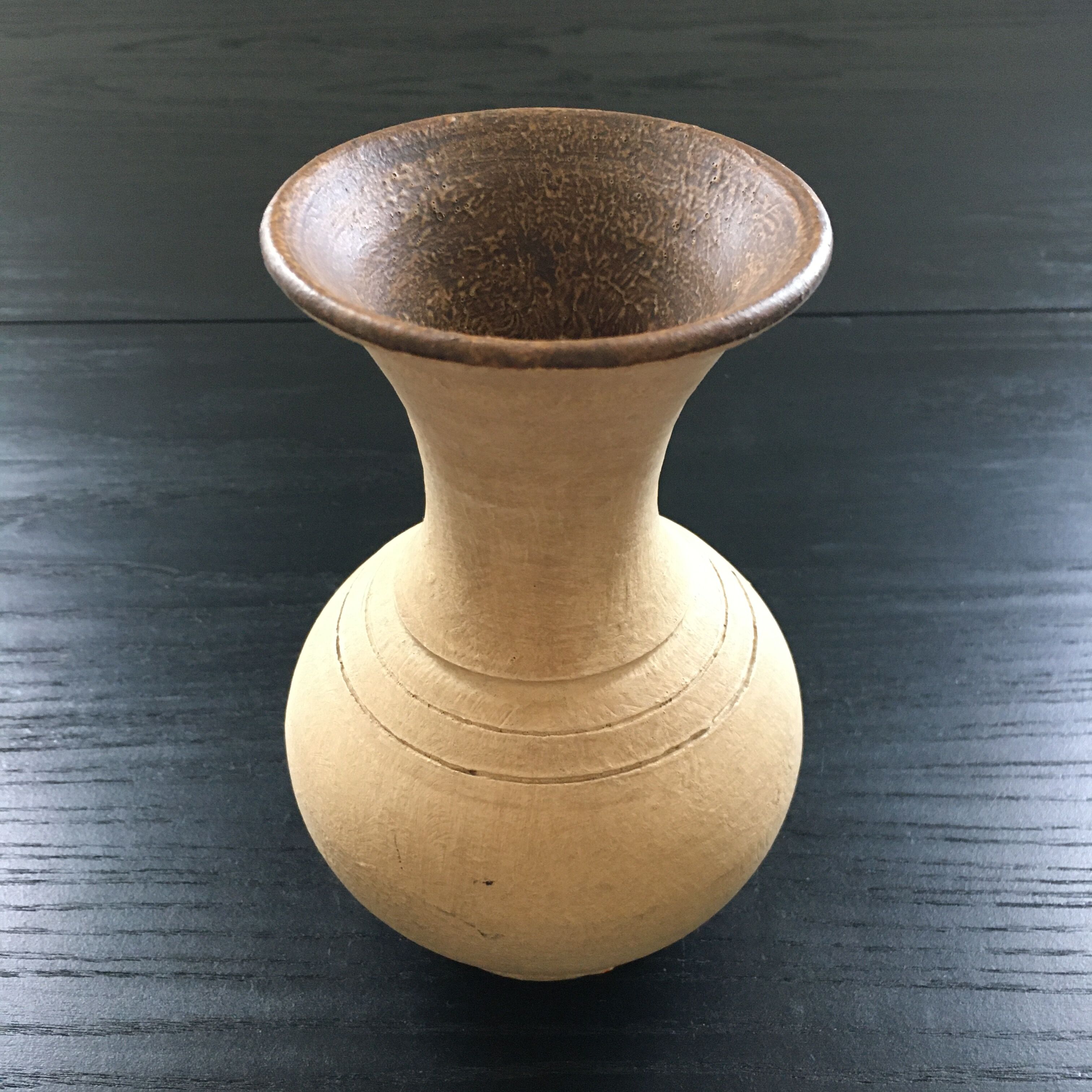 Trio of terracotta vases