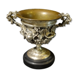 Carved silver bronze vase mounted on marble pedestal