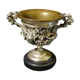 Carved silver bronze vase mounted on marble pedestal