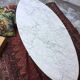 Table basse ovale marbre et palissandre