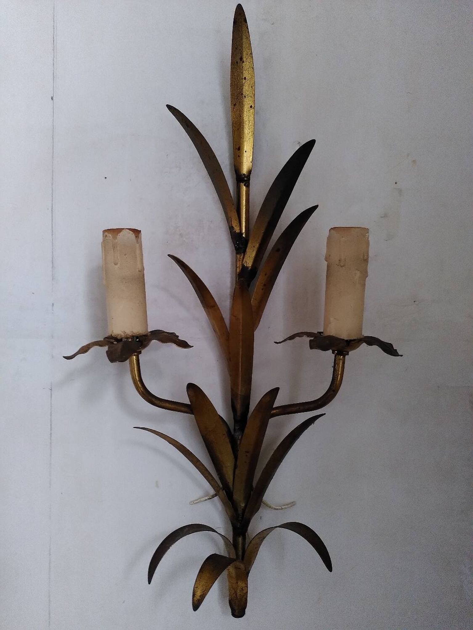 Pair of gold metal leaf wall sconces