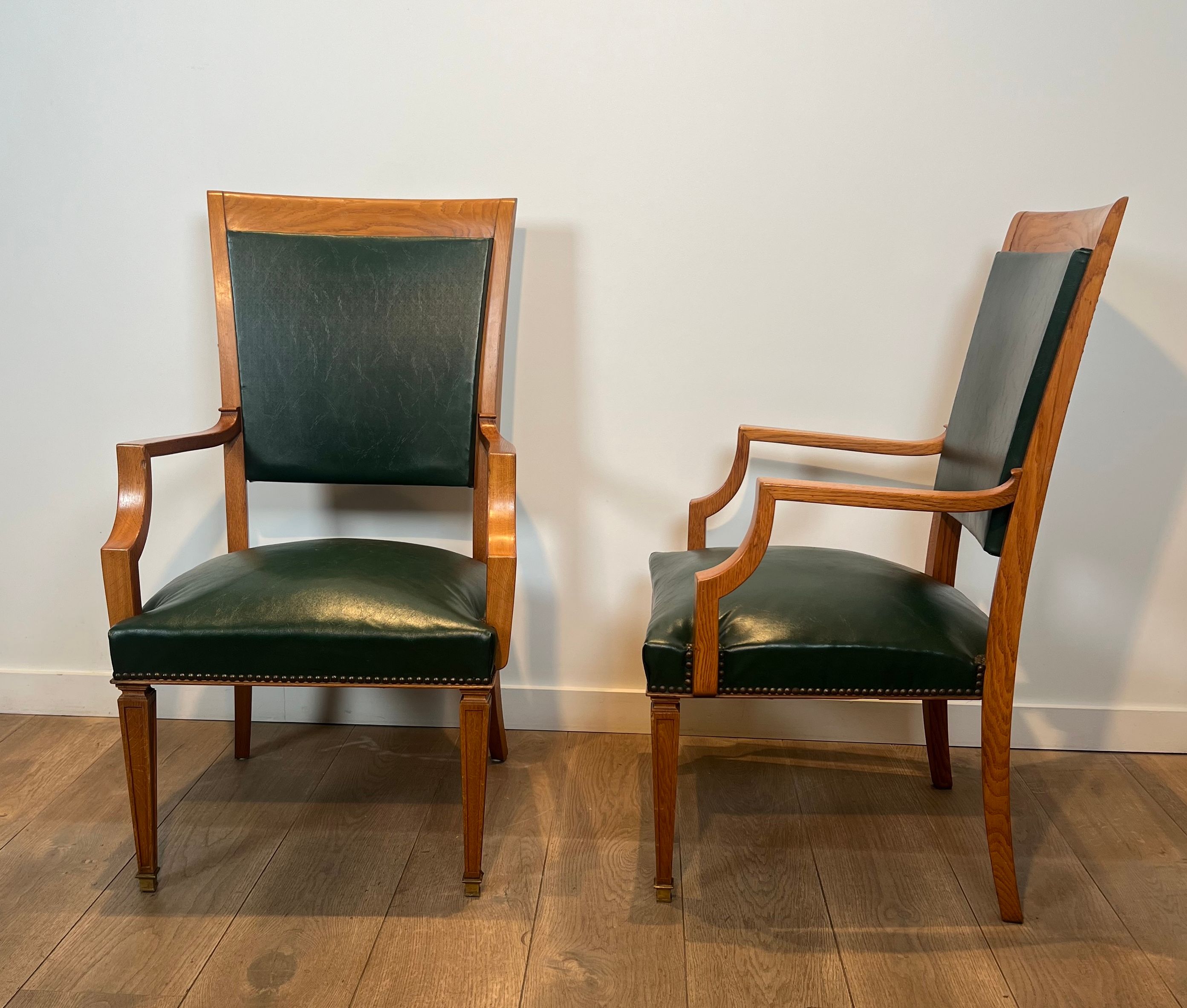 Paire de fauteuils Art déco en chêne et cuir de De Coene Frères