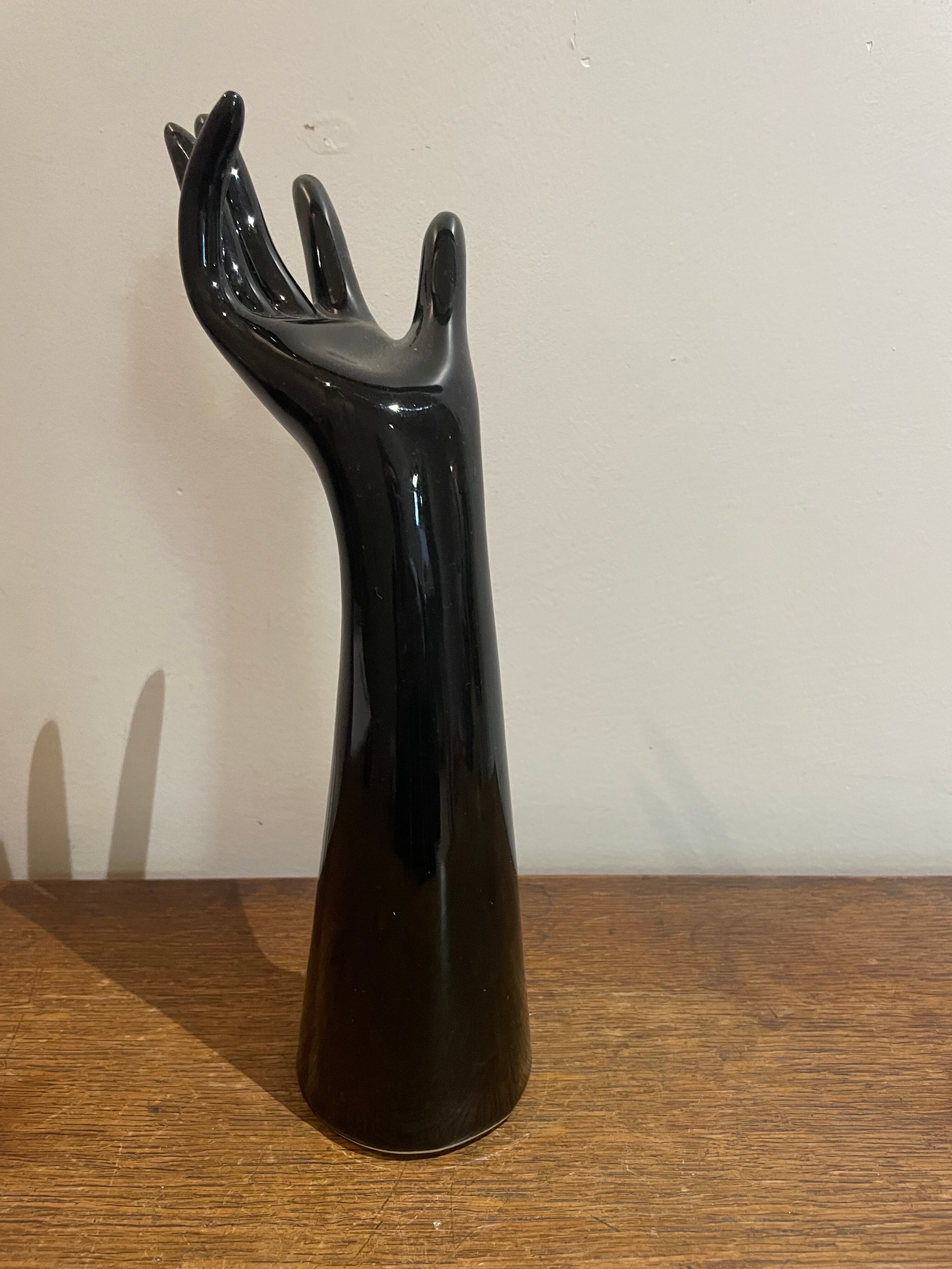 Black ceramic hand sculpture