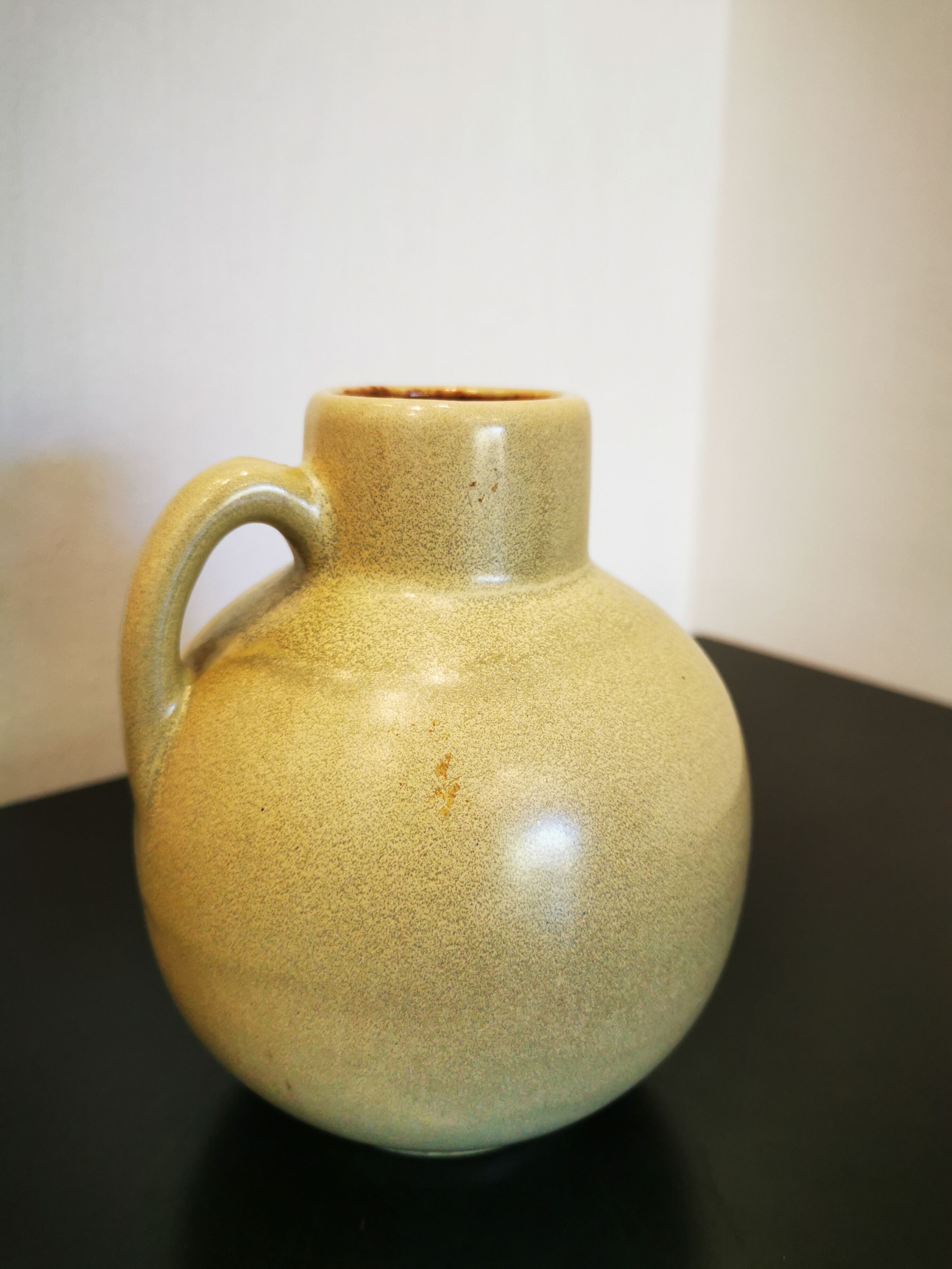 Vintage sleek handle vase