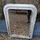 Antique mirror with carved wooden frame