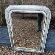 Miroir ancien avec cadre en bois sculpté 