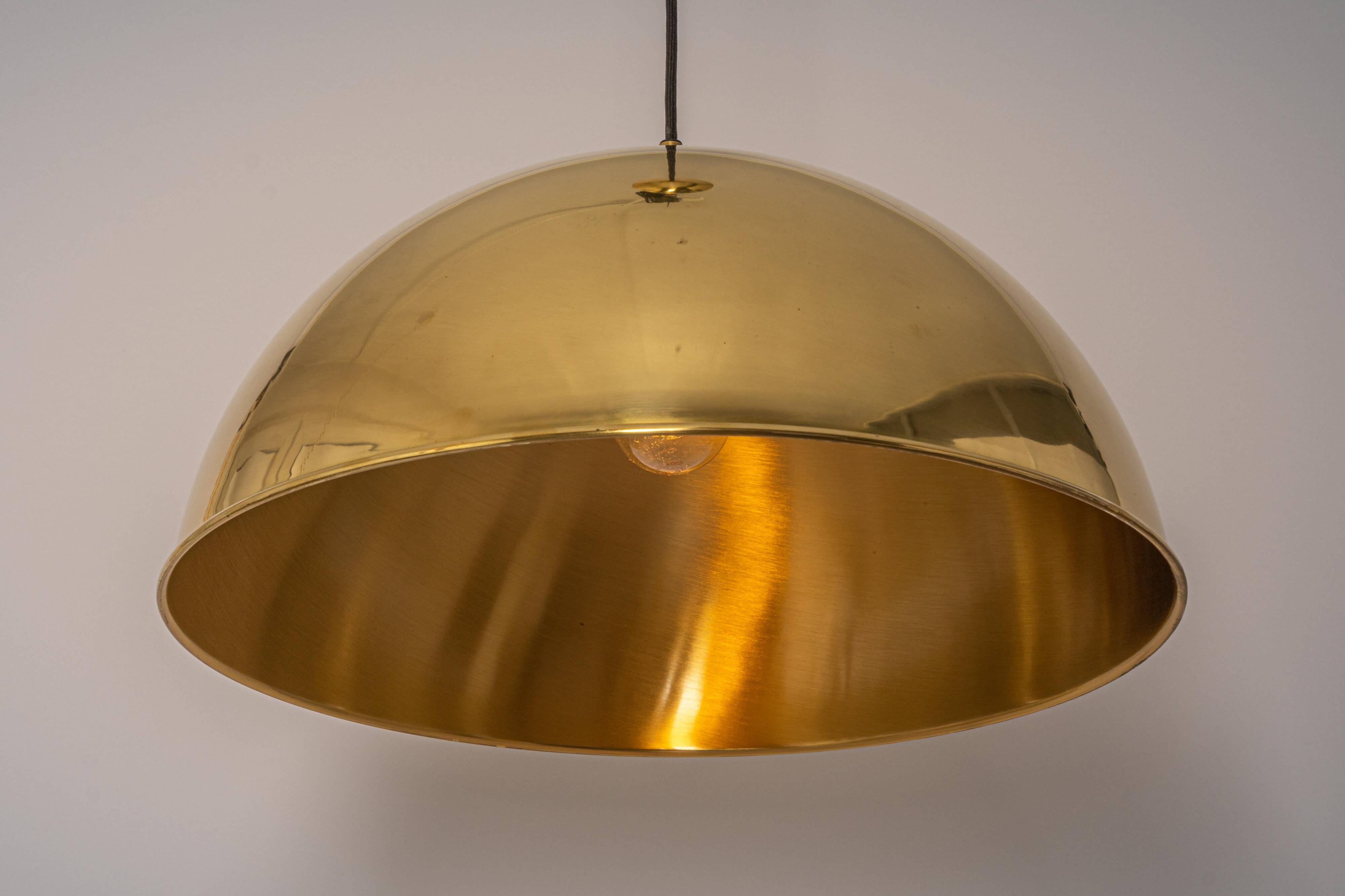 Large suspended brass chandelier by Florian Schulz, Germany.