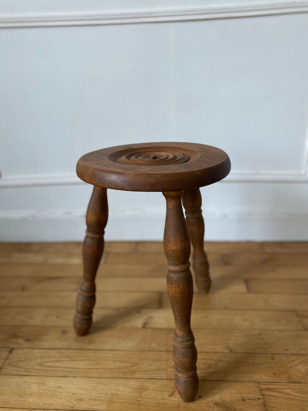 Wooden tripod stool