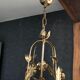 Chandelier suspension in gilded metal and grapevines