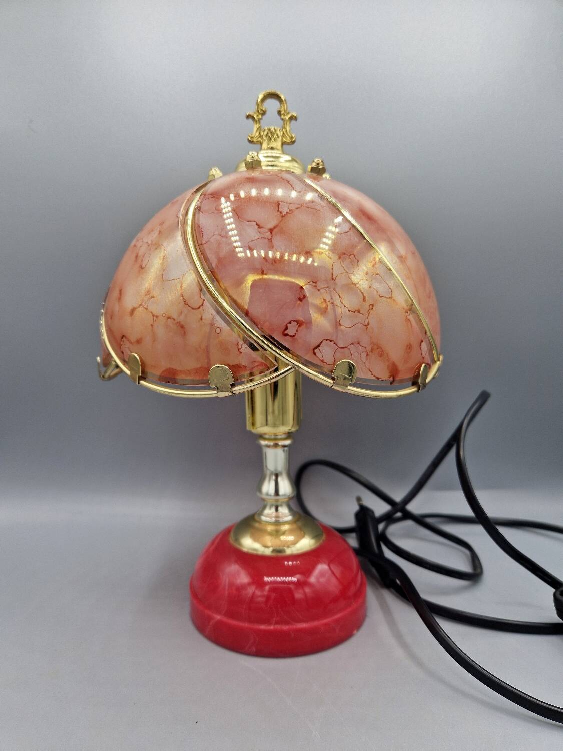 Vintage pink glass globe lamp with brass details and pink base