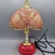 Vintage pink glass globe lamp with brass details and pink base