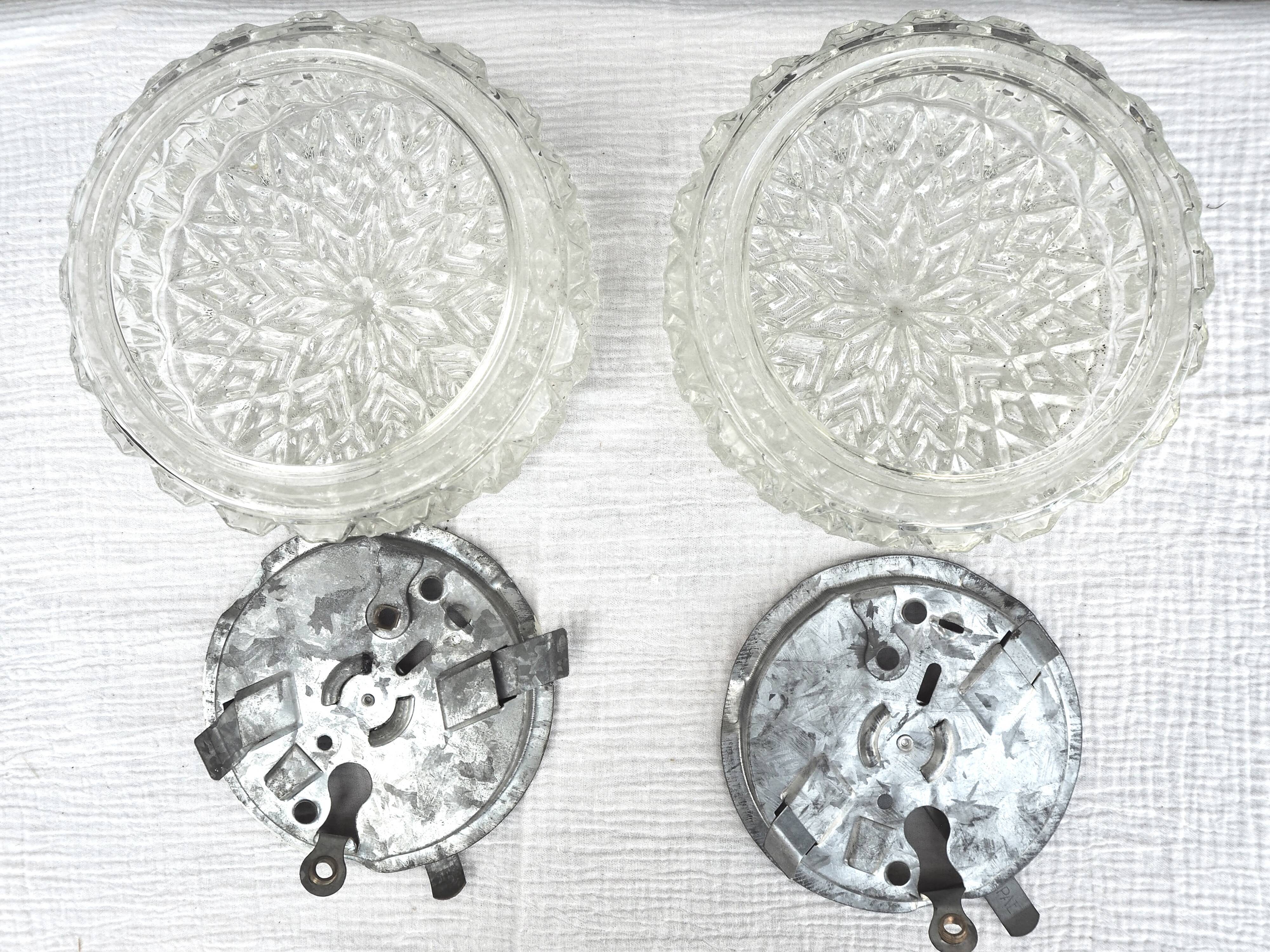 Pair of round ceiling lights in chiseled glass