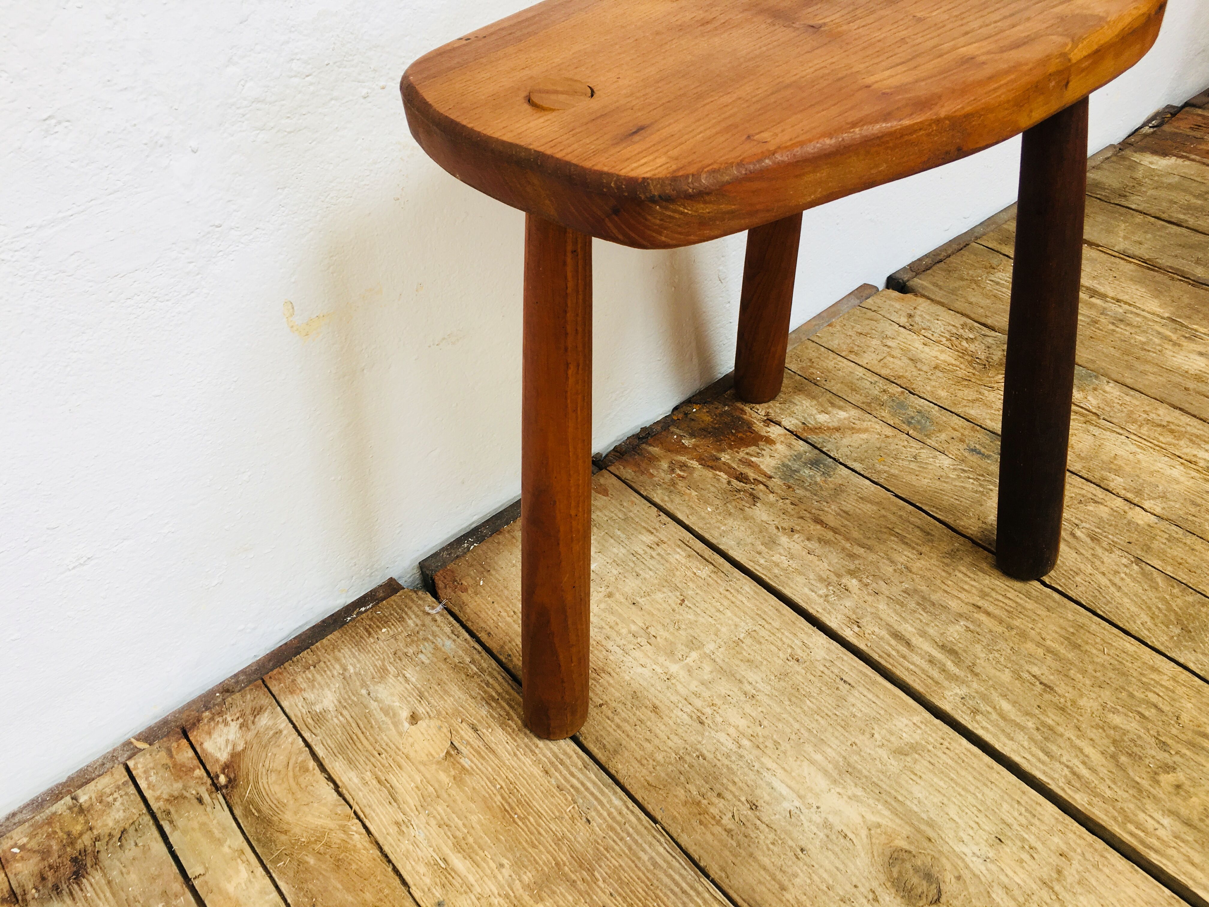 Wooden tripod stool