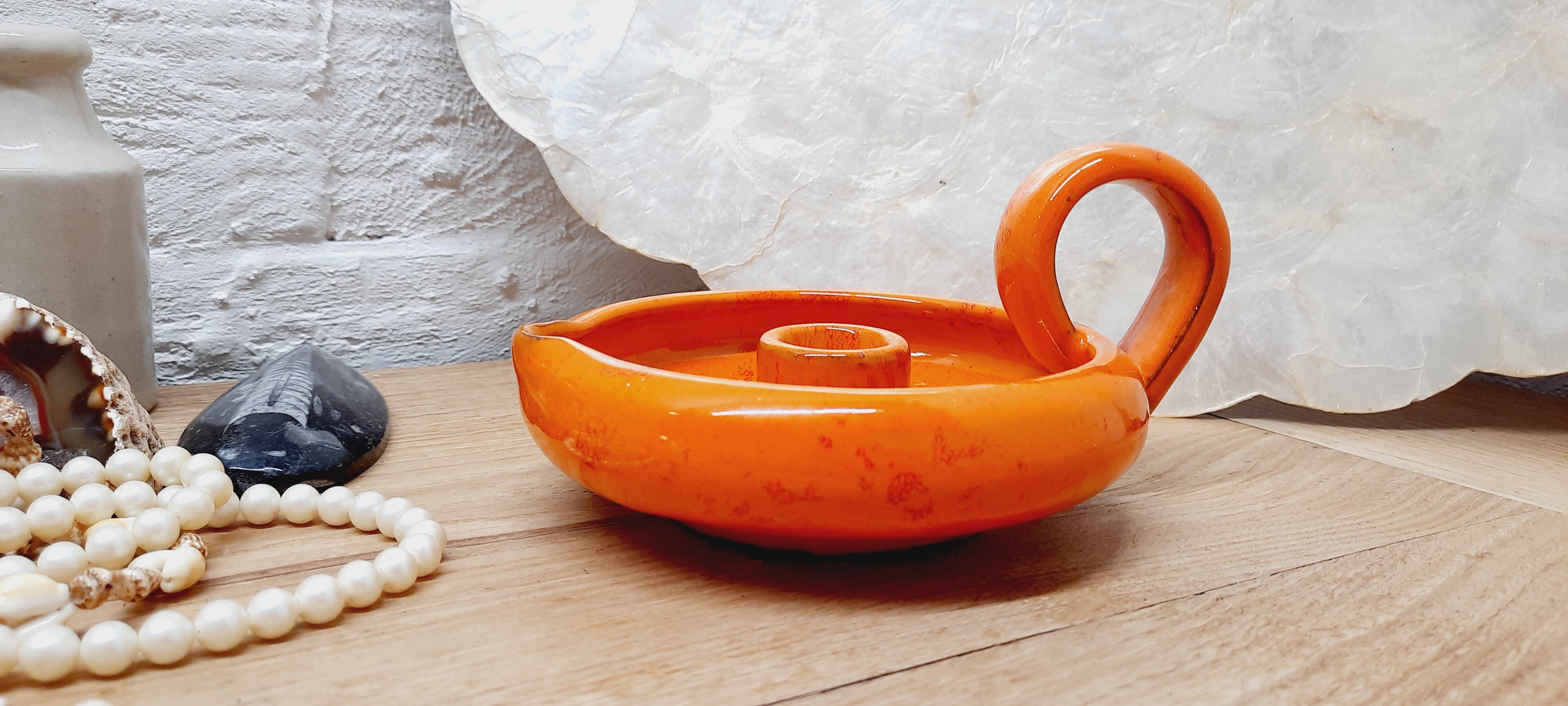 Orange cellar rat candle holder