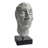 Clay sculpted head on marble base, 32 cm