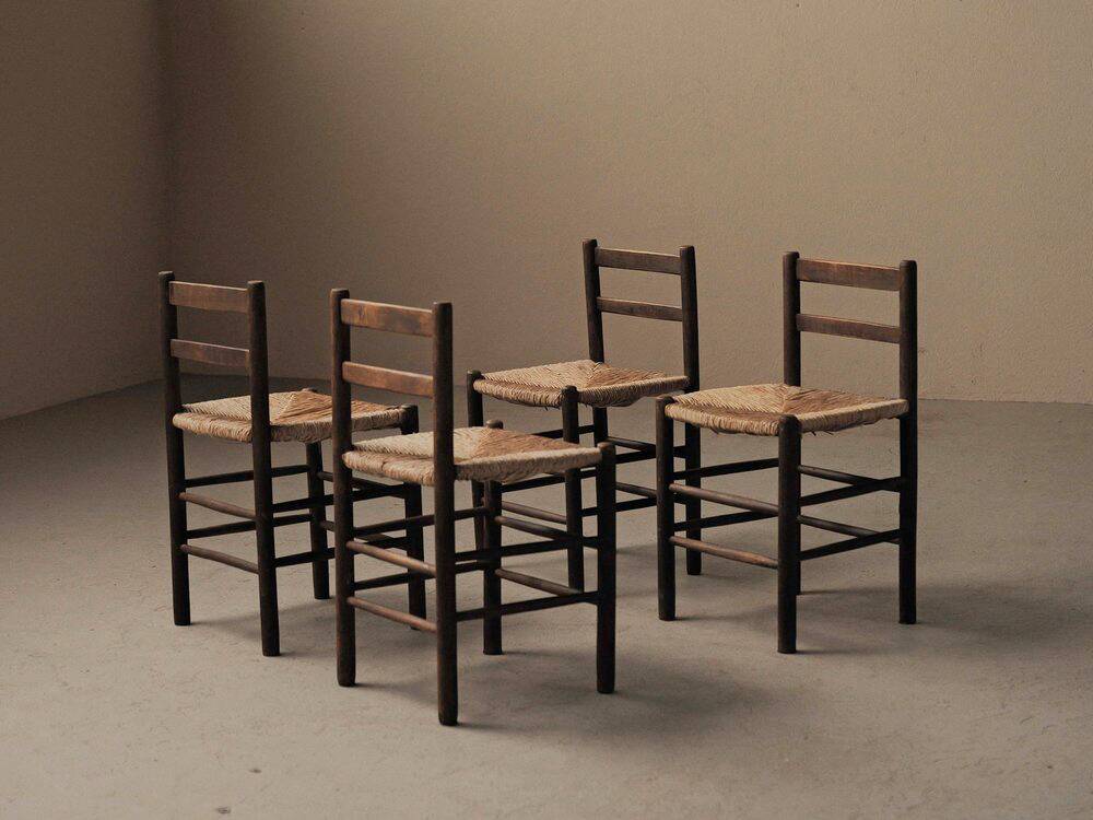 Set of four wooden and straw chairs, around 1960.