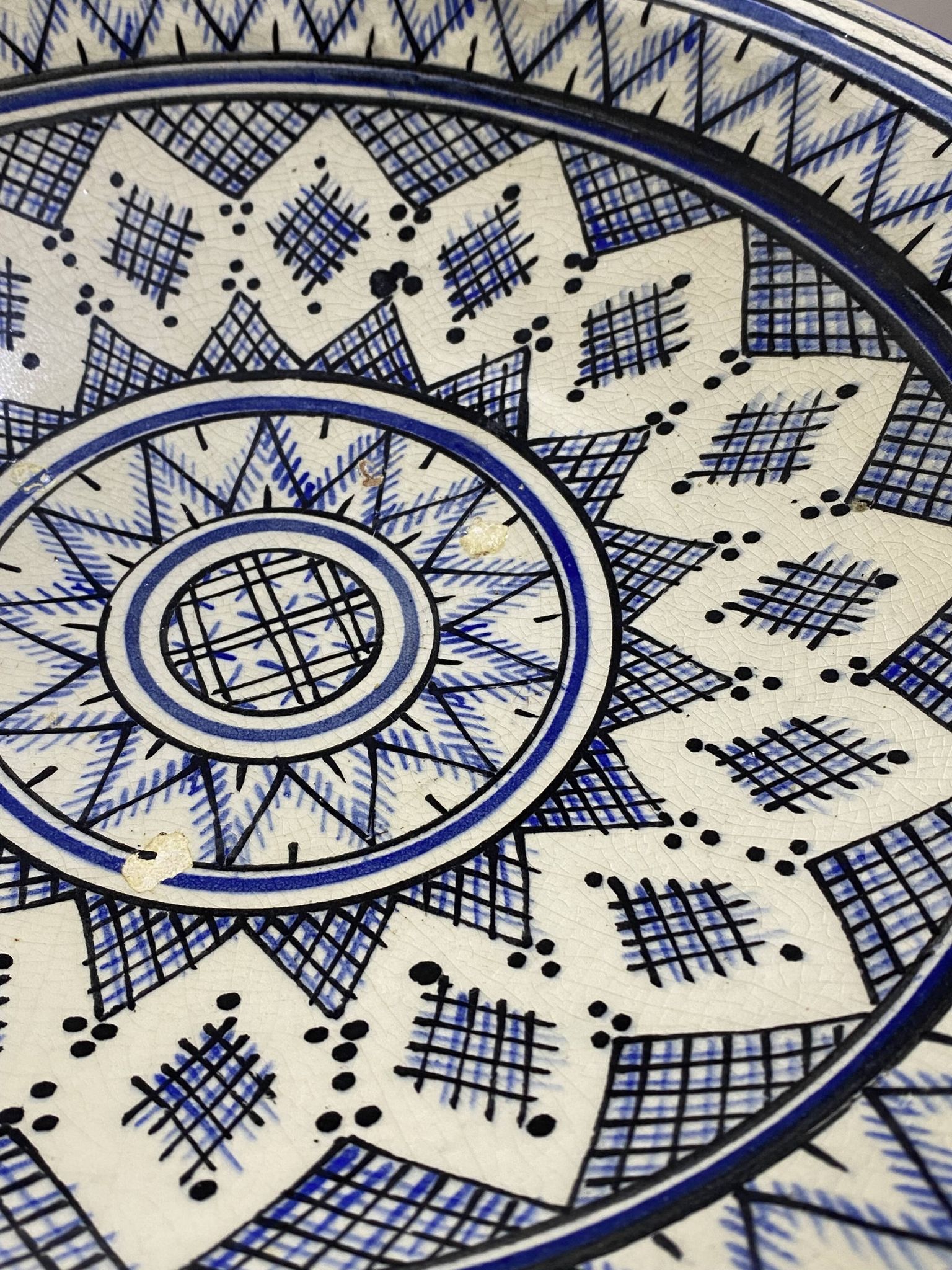 Moroccan dish in handcrafted sculpted ceramic, blue geometric patterns and