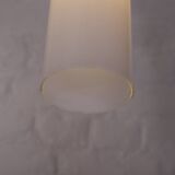 Doria pendant lights in lined frosted glass.