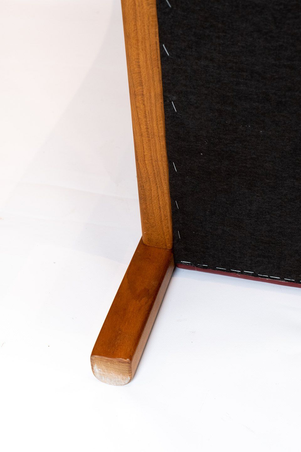 Two seater sofa upholstered with black leather and of danish design