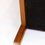 Two seater sofa upholstered with black leather and of danish design