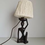 Ebony lamp with seated woman / 1930s