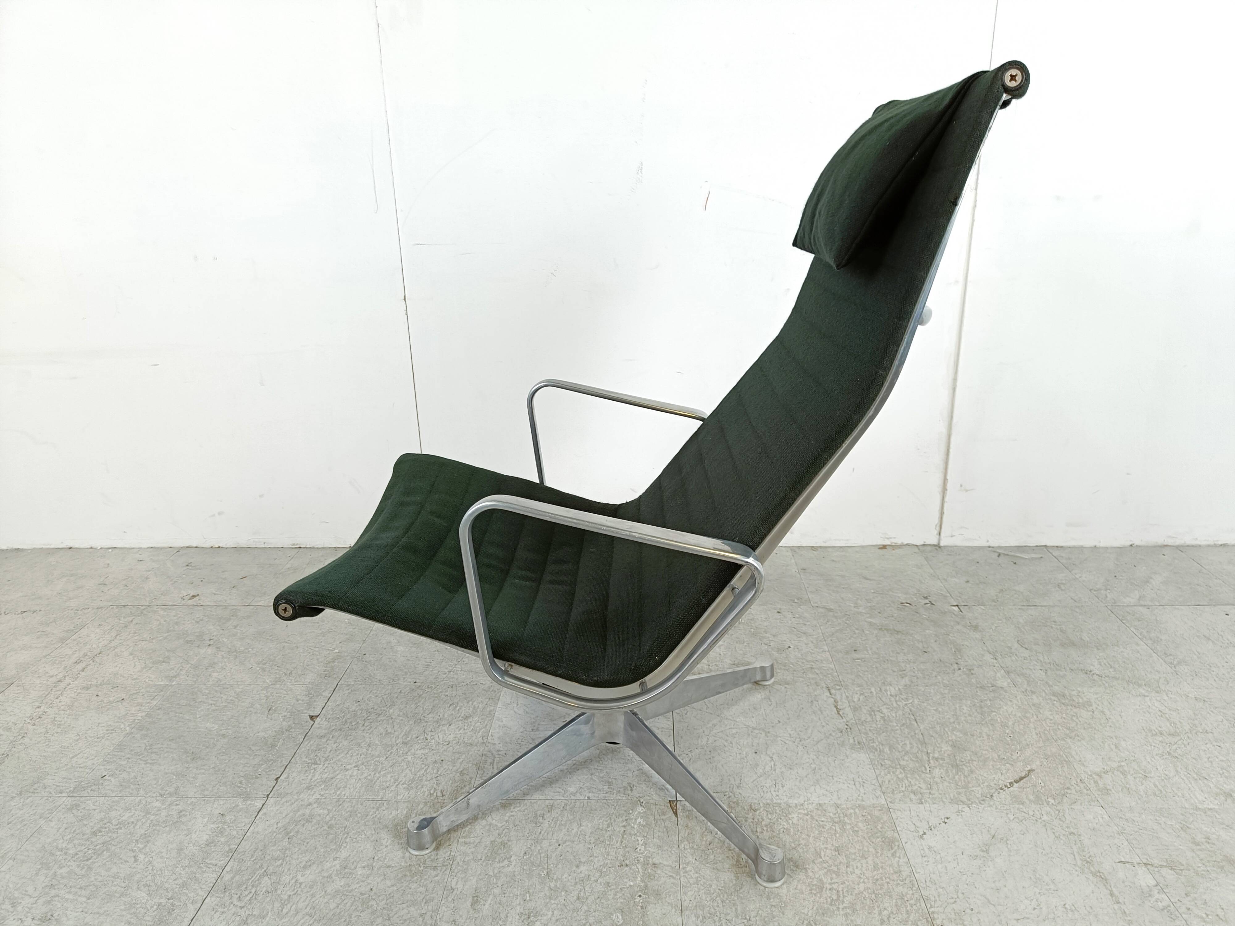 Charles & Ray Eames EA124 Lounge chair in black fabric, 1970s
