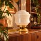 Zoé — Table lamp in speckled white Clichy glass and gold brass.