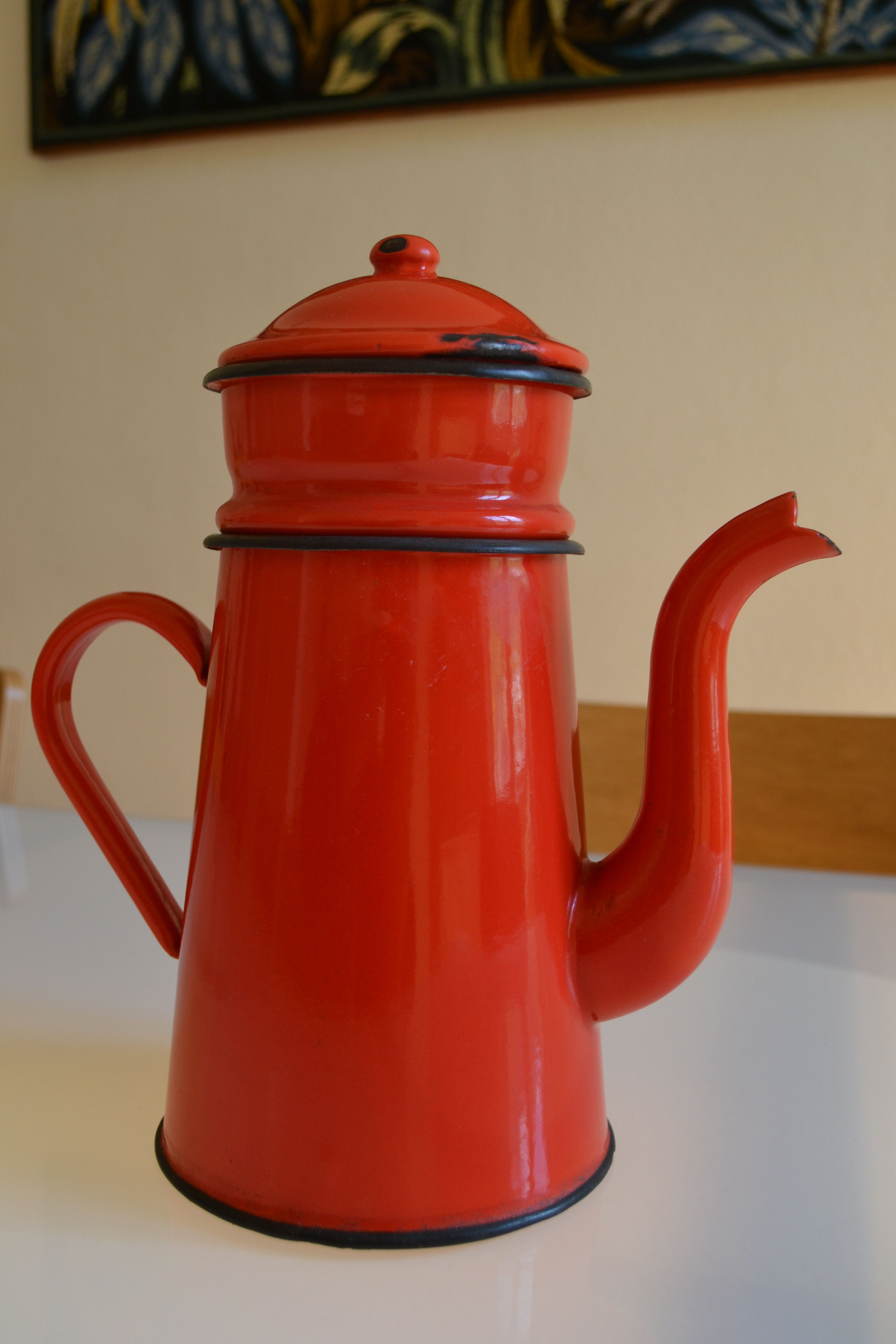 Vintage coffee maker in red and black enamelled sheet