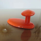 Orange plastic hook 70s