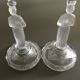 Pair of glass figure candle holders