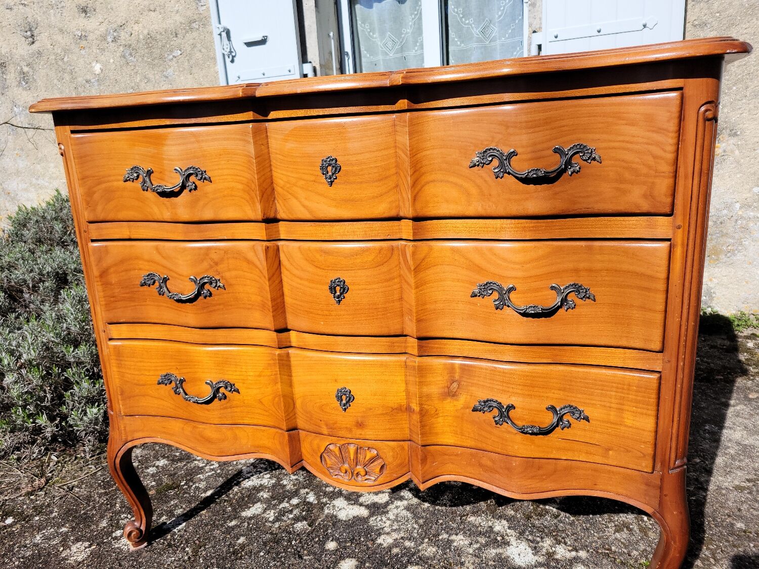 Louis XV style crossbow commode in cherry wood