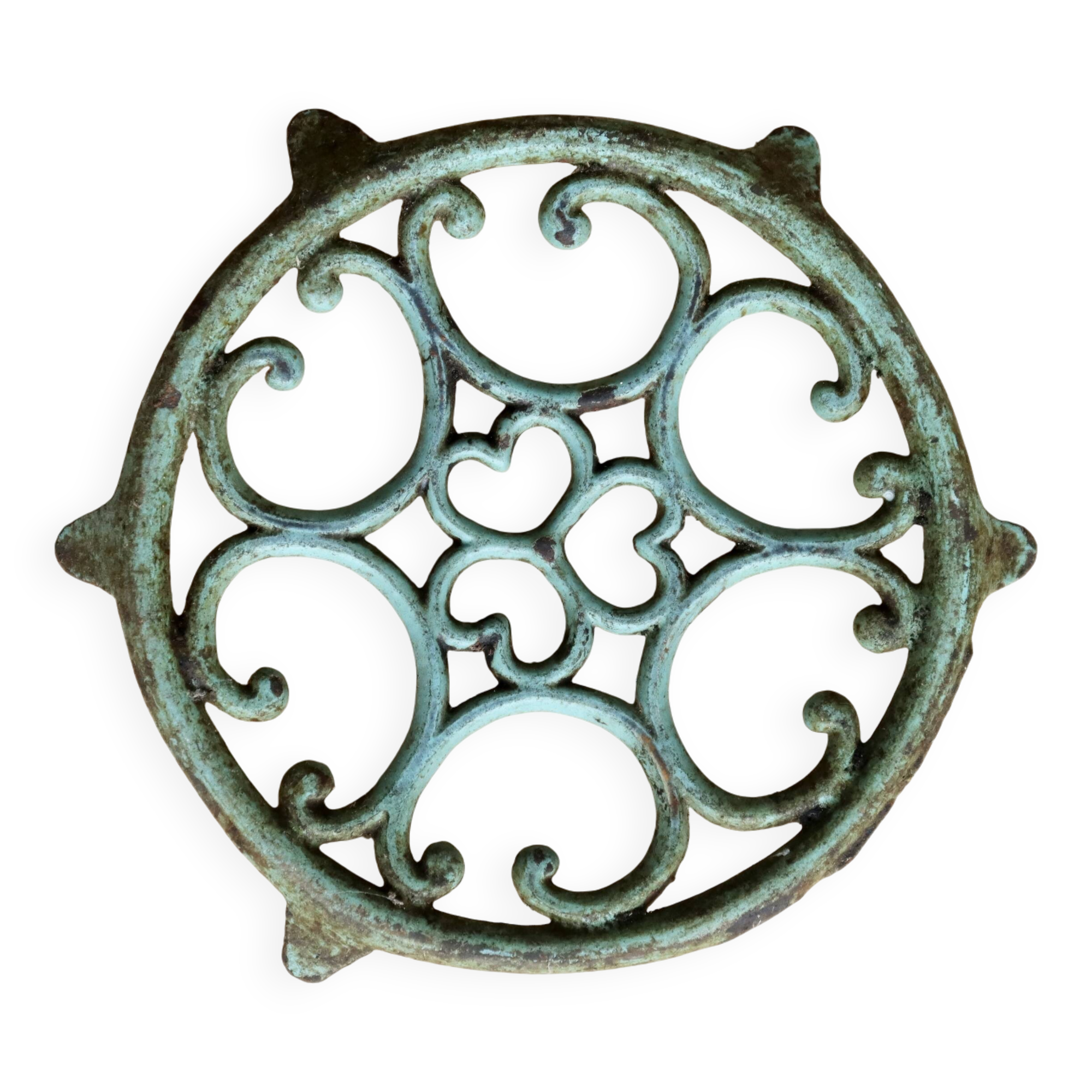 Antique round turquoise cast iron trivet.