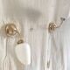 Articulated brass and opaline wall lights - mid 20th century.