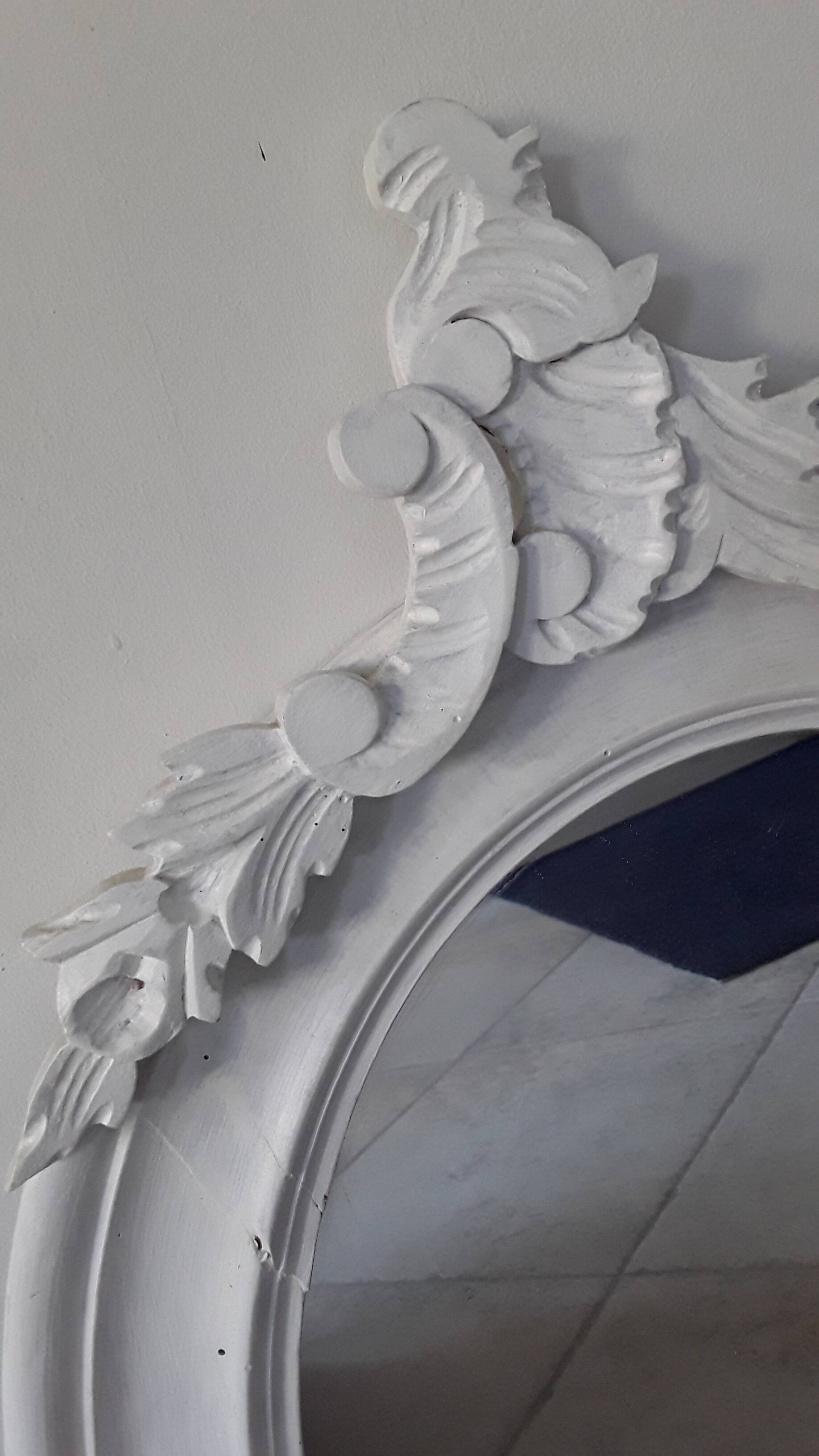 Antique oval mirror in painted wood