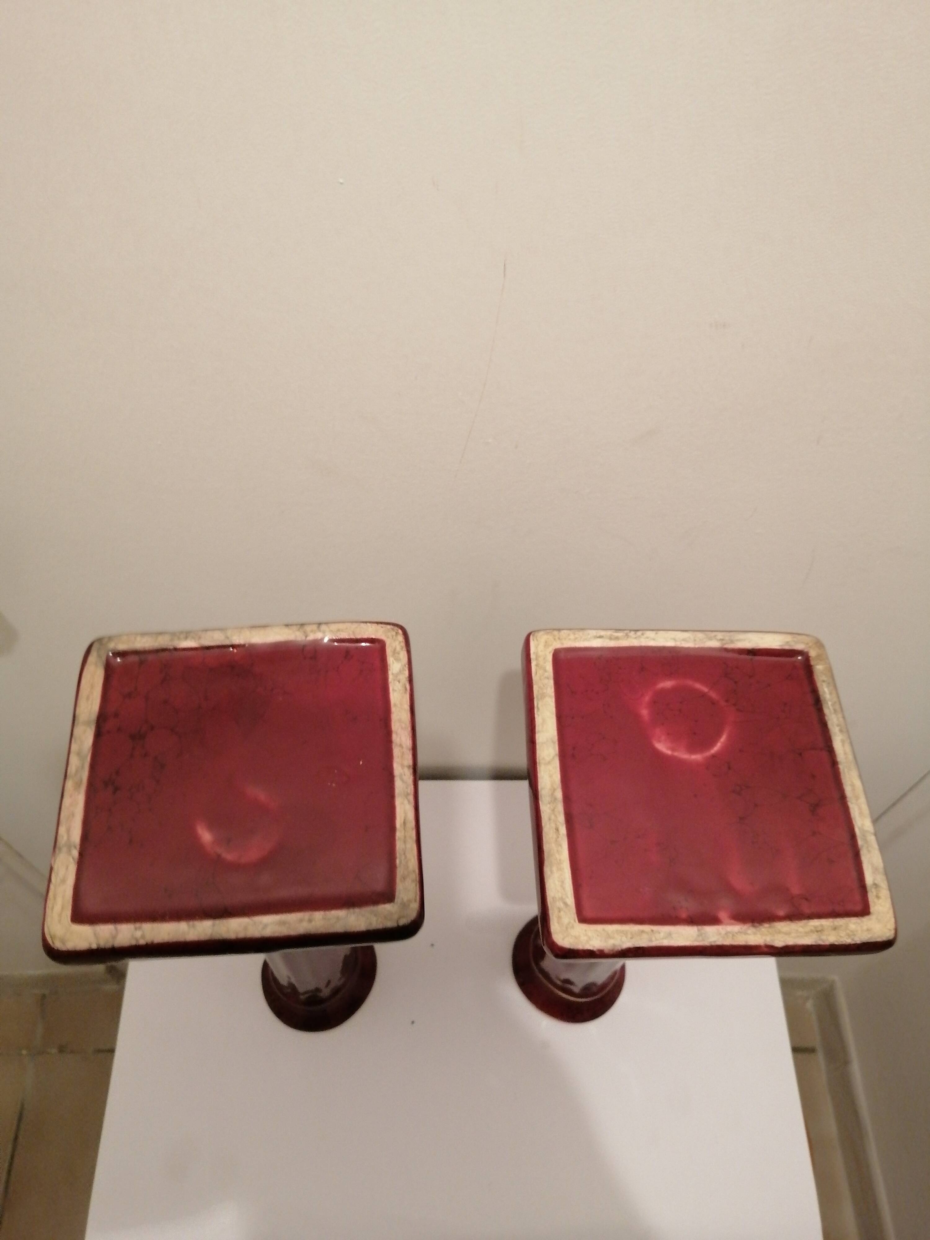 PAIR OF CERAMIC TORCHES