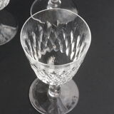 Suite of 6 Baccarat crystal water glasses with honeycomb patterns.