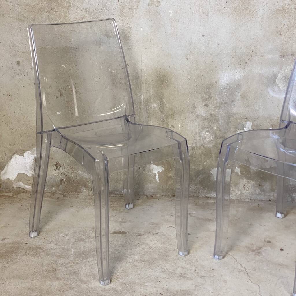 Pair of transparent polycarbonate chairs