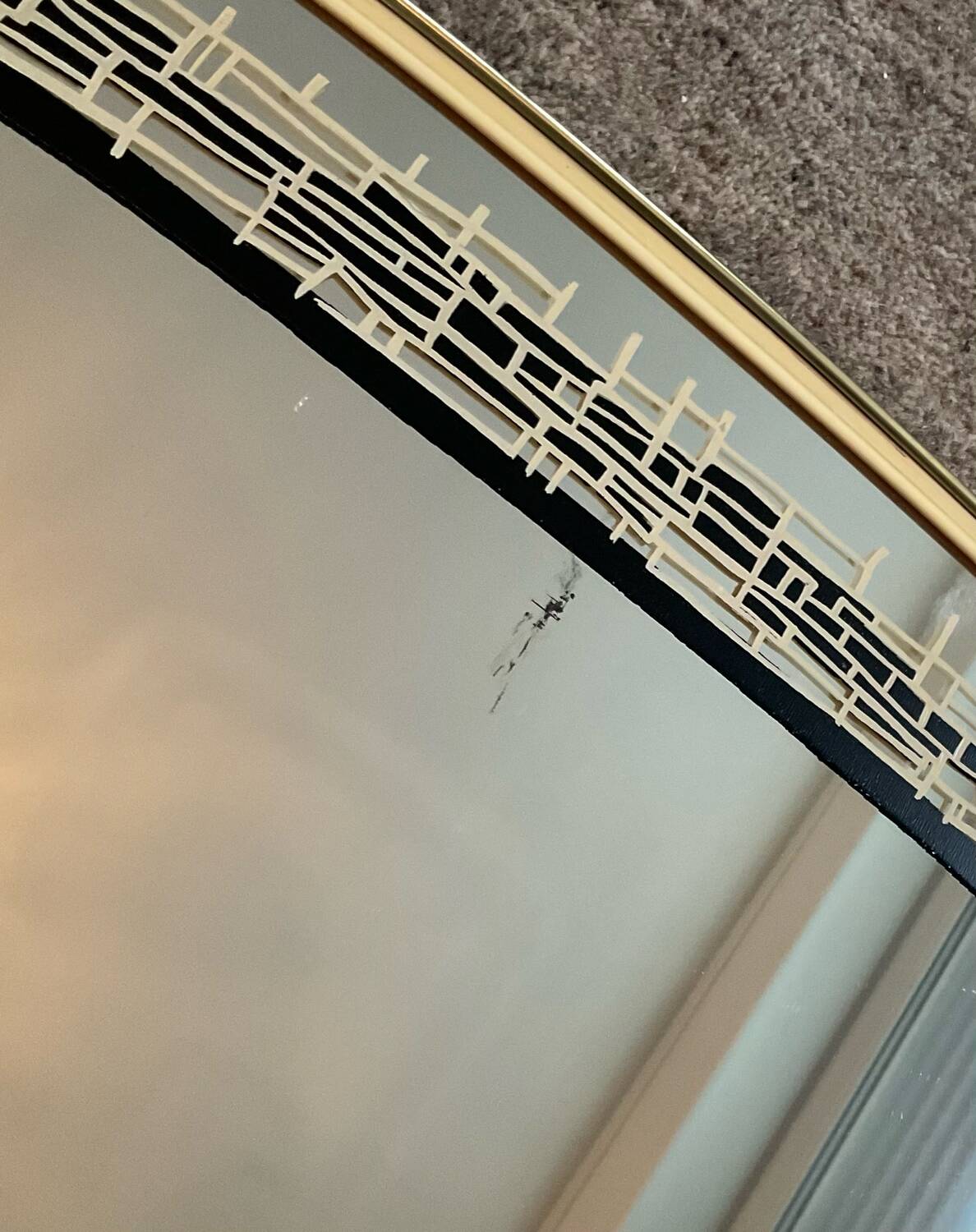 Asymmetrical free-form mirror from the 1970s