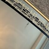 Asymmetrical free-form mirror from the 1970s