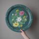 Metal serving tray with hand-painted floral decoration in a country flea market style