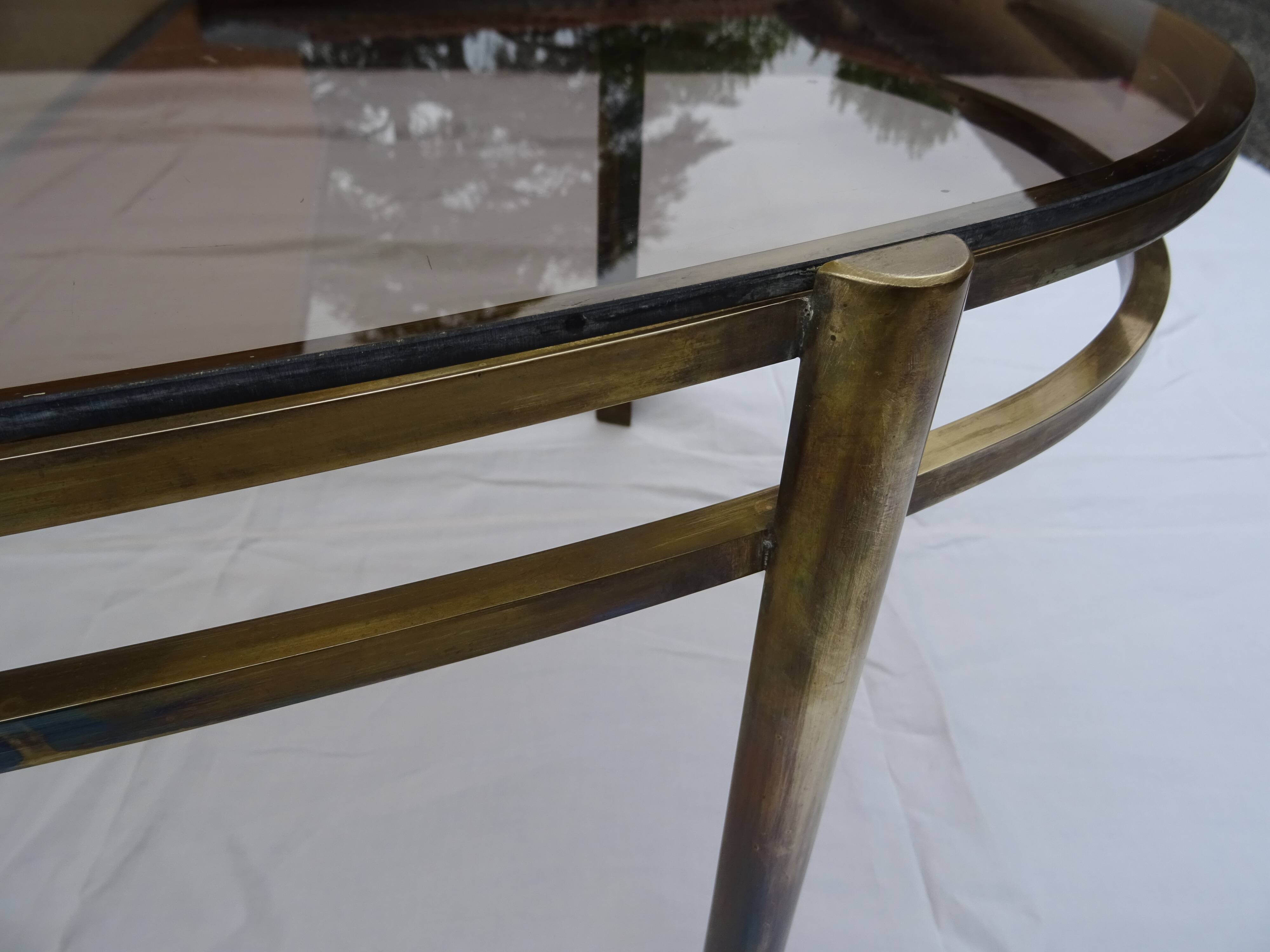 Coffee table low oval bronze doré Jacques Quinet 1950/1960