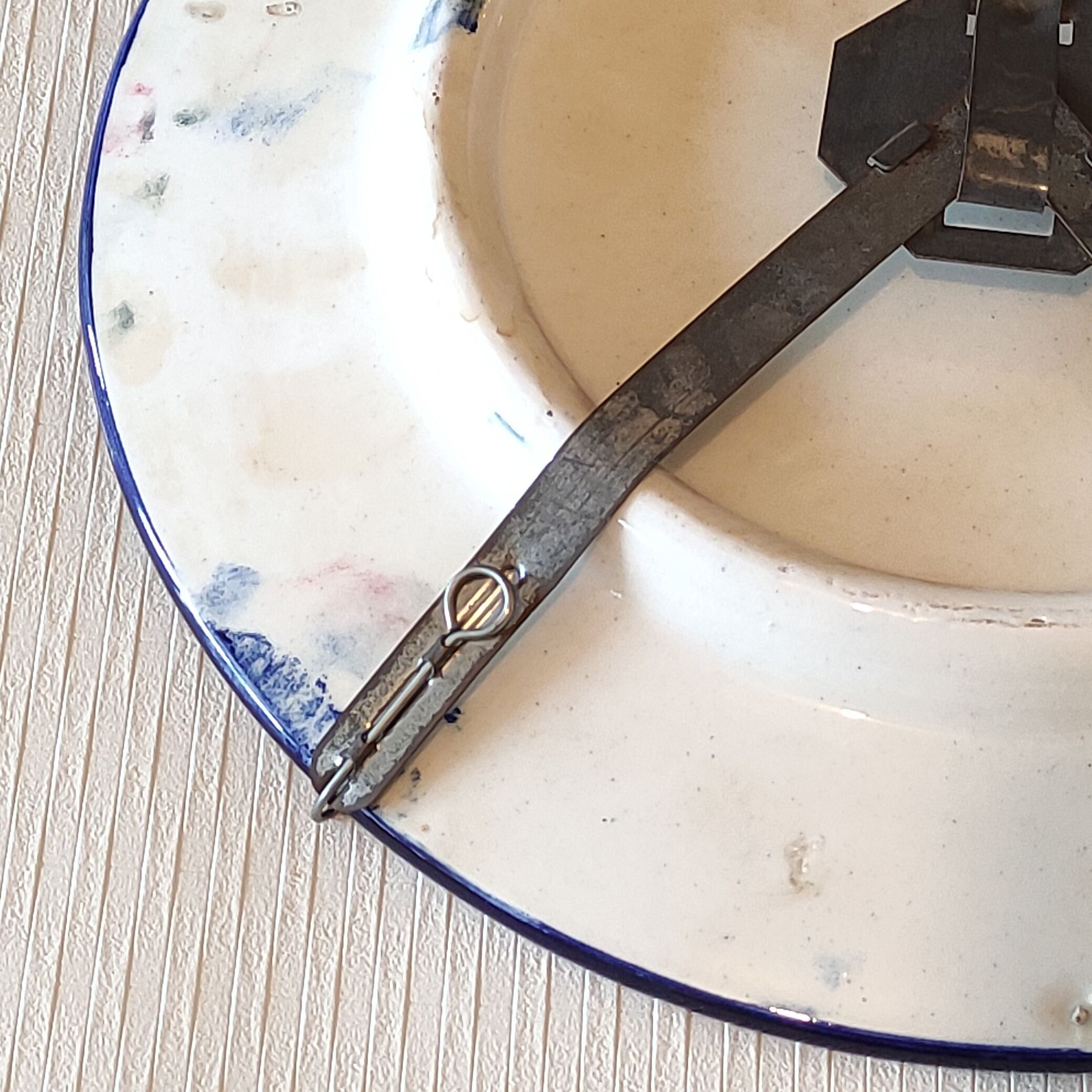 Hand-painted decorative plate decorated with a blue chimera pattern