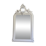 Late 19th-century mirror with a decorated pediment. 112x66.