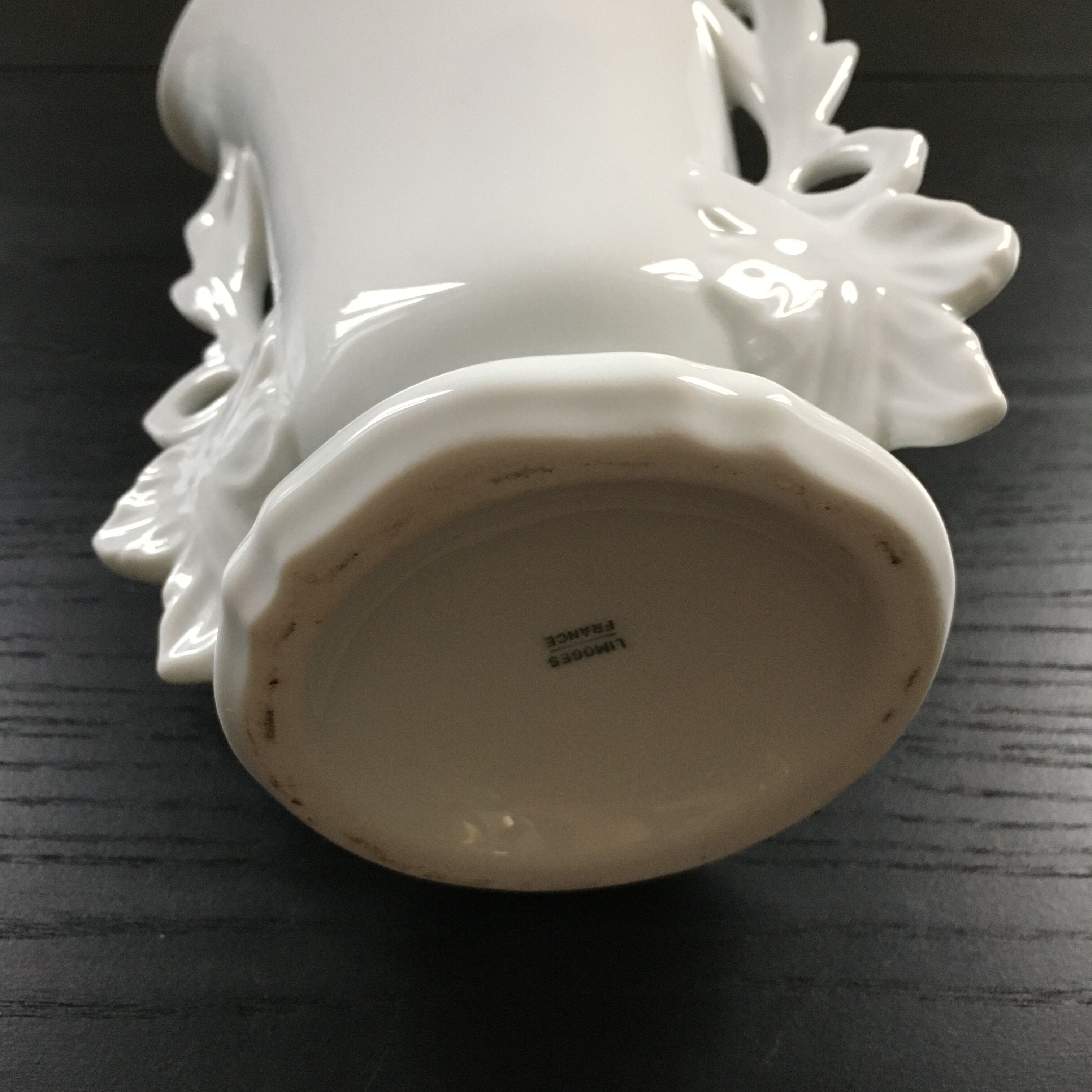 White vase flowery handles