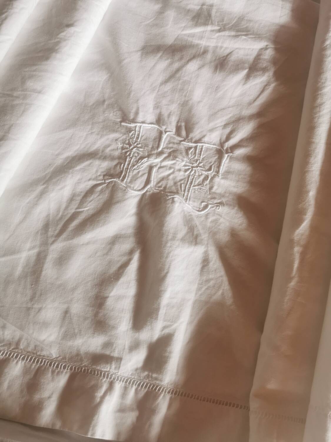 Old large monogrammed sheet hand-embroidered.