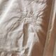 Old large monogrammed sheet hand-embroidered.