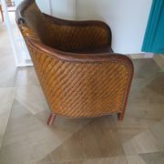 Woven rattan armchair and exotic wood in colonial style, 1980s.