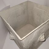 Square planter with a patinated iron lion's head